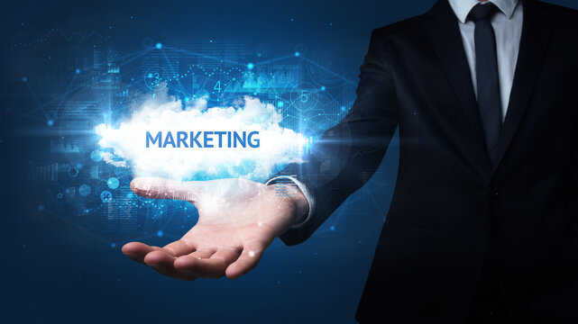 Hand of Businessman holding motivational message