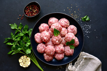 Homemade raw meat ball. Top view with copy space. - obrazy, fototapety, plakaty