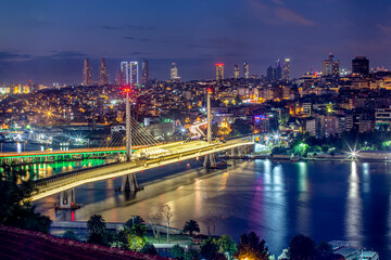 Metro station on Golden Horn bridge in Istanbul, Turkey. Golden Horn (Halic) Metro Bridge at sunset. The bridge connects the Beyoğlu and Fatih districts on the European side of Istanbul