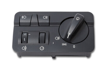 Fototapeta premium Close-up on the headlight switch control buttons and automatic adjust level dashboard of car in the vehicle repair workshop on white isolated background. Auto service industry