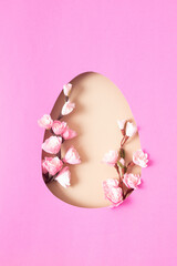 Paper cut Easter egg with cherry blossom branch. copy space