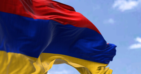 Detail of the national flag of Armenia waving in the wind on a clear day