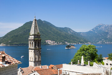Naklejka na ściany i meble Panoramic view of the city, islands and bay on the sunny day. Perast. Montenegro.