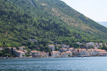 Fototapeta na wymiar Panoramic view of the city and bay on the sunny day. Perast. Montenegro.