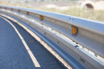 Guardrails poles covered crash-absorber beam