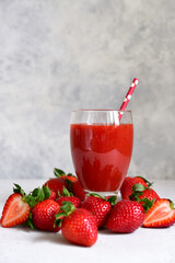 Fresh strawberry smoothie in a glass.