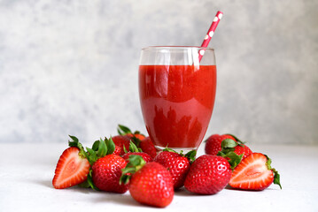 Fresh strawberry smoothie in a glass.