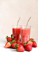 Fresh strawberry smoothie in a glass.