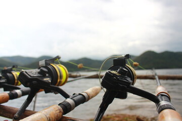 fishing rod and reel on the lake