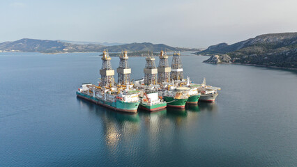 Aerial drone photo of crude oil drill ships anchored near bay of Salamina, Attica, Greece
