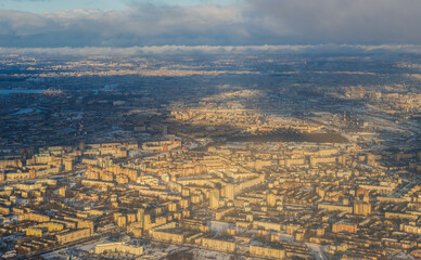 Aerial view of the city of St. Petersburg. Top view of residential city blocks. In the distance is...