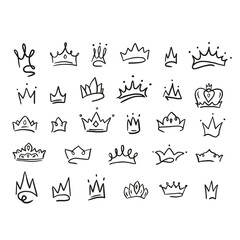 Big set of different crown icons drawn in doodle style.Vector illustration.Crowns of princes, princesses, kings, queens made by hand.