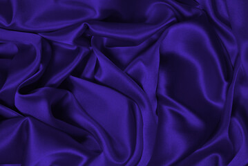 Purple silk or satin luxury fabric texture can use as abstract background.