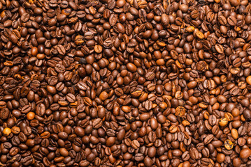 Coffee beans on a white background. Top view.