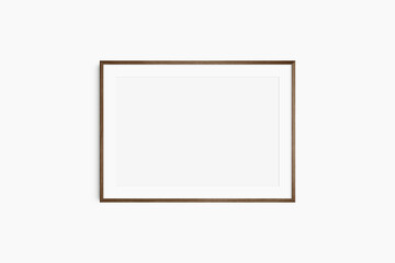 Horizontal frame mockup 7:5, 70x50, A4, A3, A2, A1 landscape. Single dark brown walnut wood frame mockup. Clean, modern, minimalist, bright. Passepartout/mat opening in 3:2 aspect ratio.