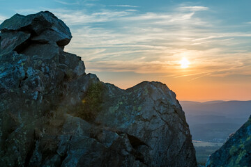 Rock formation at the summit of the Wolfwarte in the Harz Mountains at sunset