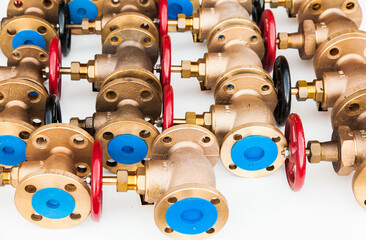 A lot of valves on a white background. View from above.