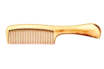 Golden hairbrush on a white isolated background.