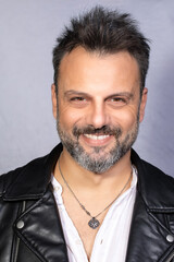 Obraz premium Portrait of a grizzled man with a gray beard and mustache