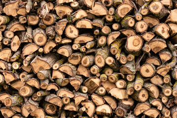 A pile of lumber abstract background.Firewood, timber