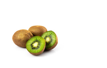 Ripe kiwi fruit, whole and halves on a white background