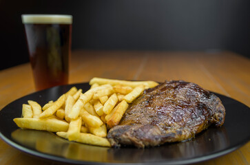 Delicious grilled entrecote dish with french fries