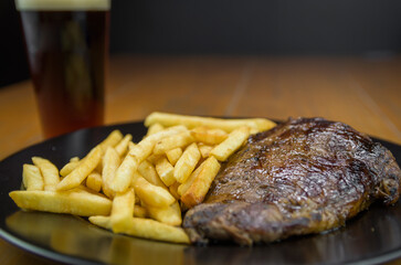 Delicious grilled entrecote dish with french fries