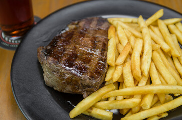 Delicious grilled entrecote dish with french fries