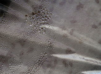 Droplets of steam on a transparent film
