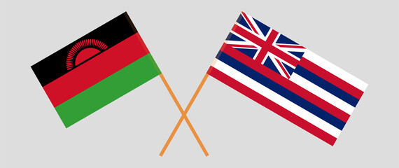 Crossed flags of Malawi and The State Of Hawaii. Official colors. Correct proportion