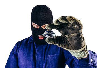 Isolated photo of robber in mask, overalls, gloves holding diamond on white background.