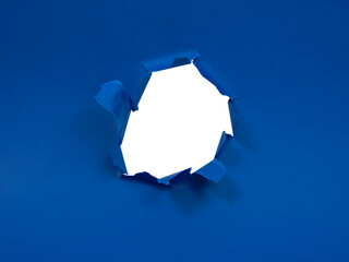 Blue torn paper hole damaged frame isolated background for text