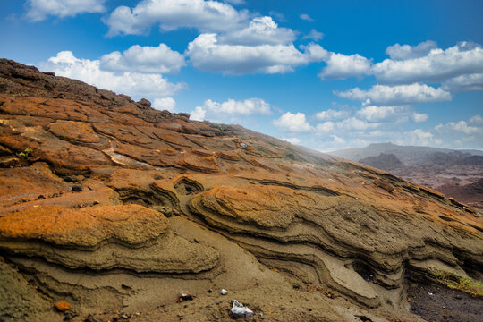 Volcanic lava rock under the blue skies of the Bartolome Island in the Galapagos Archipelago.
