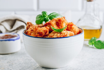 Popular Baked Cauliflower with barbeque sauce. Buffalo barbecue Cauliflower Wings. Vegan Food concept.