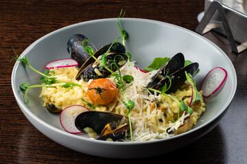 Risotto with seafood: rice, shrimp and mussels