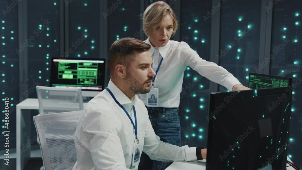 Wall mural data center. professional it staff administrator and office assistant developing software monitoring