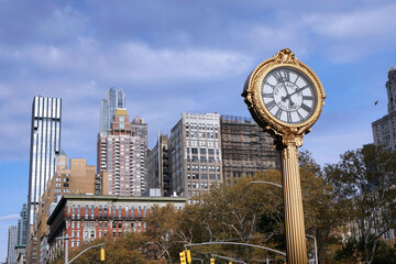 Fototapeta na wymiar Fifth Avenue sidewalk clock, a New York landmark since 1909