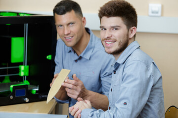 men showing another wooden based innovation