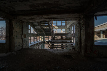 Fototapeta na wymiar war. building after the bombing. destroyed building. old abandoned building. Old stairs of an abandoned house. old room interior