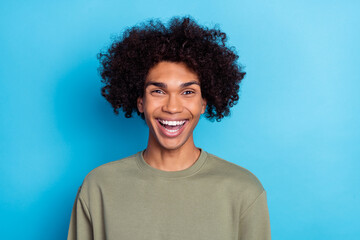 Photo of youth cheerful guy good mood laughing humorous comedy april isolated over blue color...