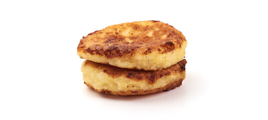 Freshly baked cottage cheese pancakes, isolated on white background.