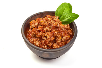 Classic italian bolognese sauce stewed in stewpot, isolated on white background. High resolution image.