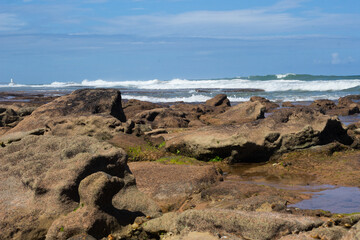Fototapeta na wymiar beautiful view of the rocks of a deserted beach