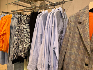 Obraz premium Сlothing store. Things hanger in a store. Wardrobe woman. 