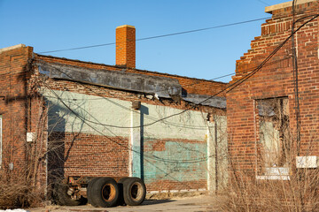 Old abandoned industrial building in the bright winter sun.  LaSalle, Illinois, USA.