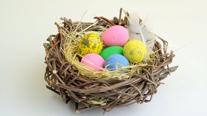 Obraz premium Easter eggs in nest. Holiday celebration concept. Minimal holiday season concept background