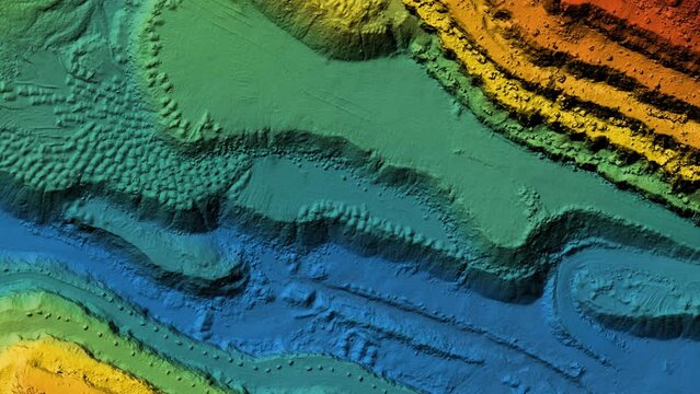 Animation of a mine elevation. GIS product made after processing aerial data taken from a drone. It shows excavation site with steep rock walls	
