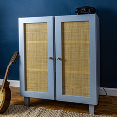 Blue painted furniture with rattan doors