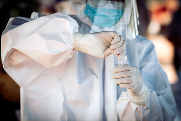 Medical professional doing a COVID antigen test