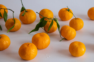 lot of tangerines on a white background